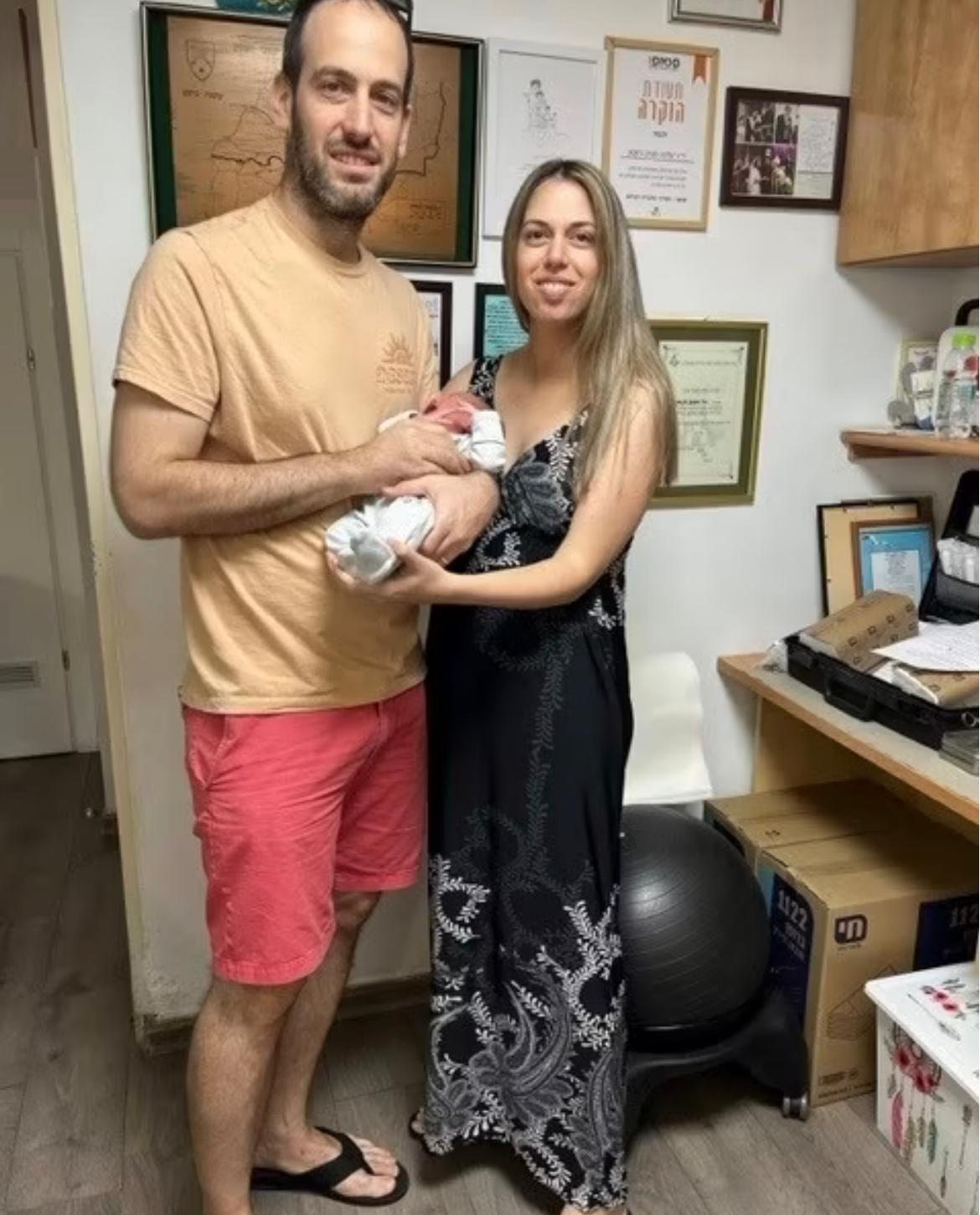 A family with their baby after the brit